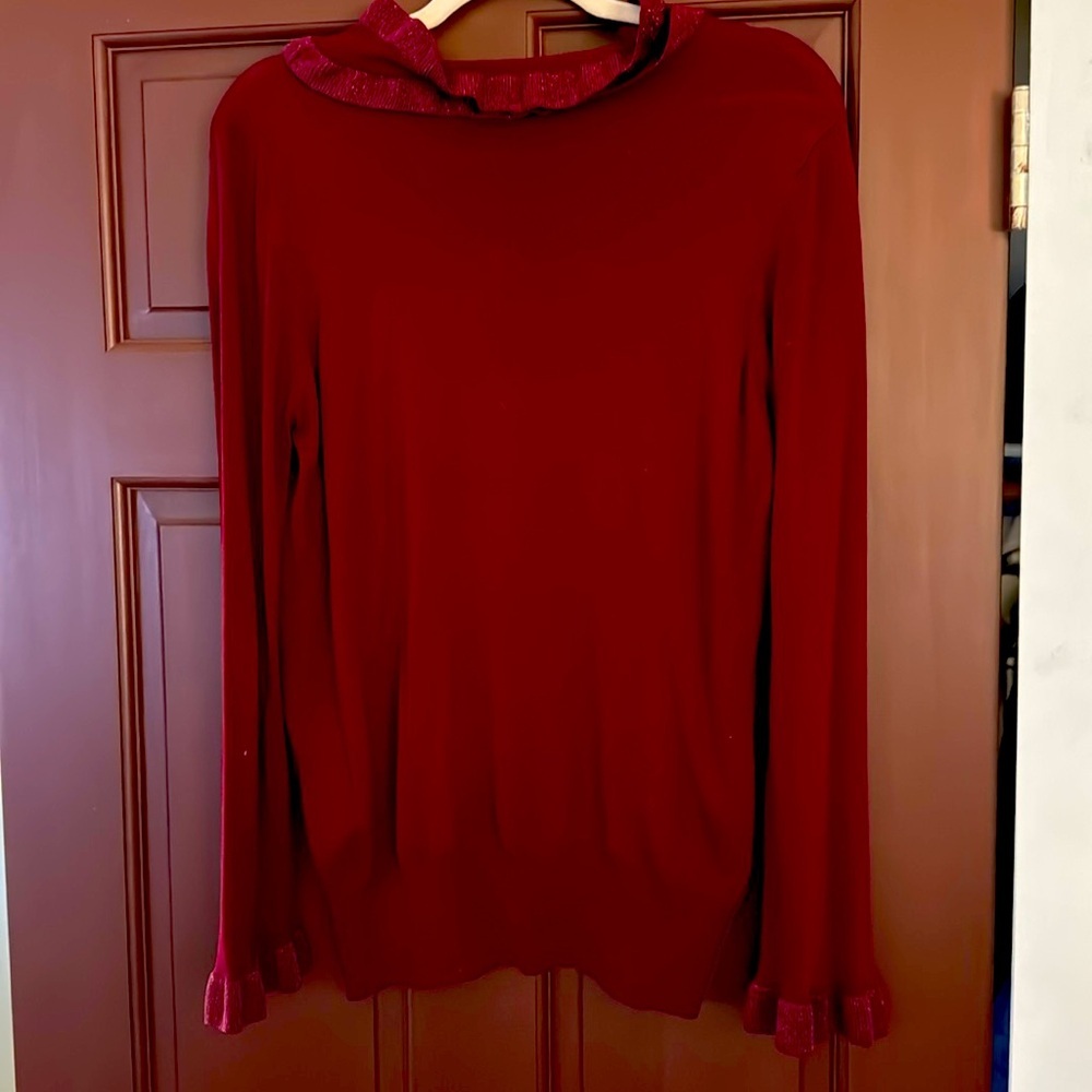 Lovely Ivanka Trump red sweater.
